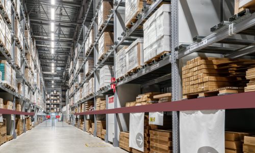 Goods on shelves of distribution center warehouse